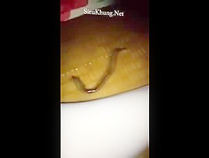 Asian woman and eel: an unusual encounter