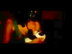 Attractive woman feeding a teddy bear