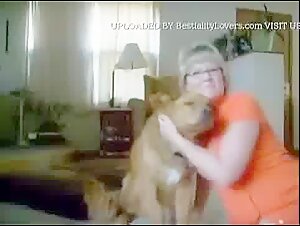 Mature woman and her dog in an intimate relationship
