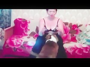 Mature woman experiences sex with a dog for the first time
