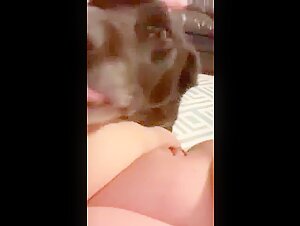 Screaming wife gets licked by dog