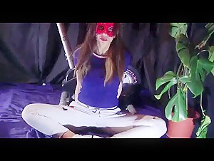 Sexy and naked woman has fun with a dog