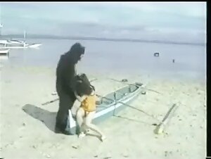 Sleeping Asian fucked by a gorilla - Video