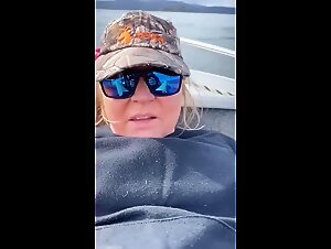 Slut fucks her dog after biting a fish in her needy pussy