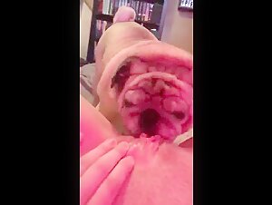 Submissive woman being licked by her dog