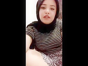 Turkish woman in hijab gets licked by dog