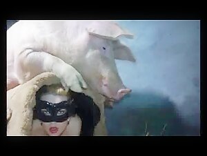Woman and pig in a beastly video