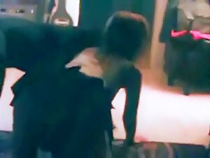 Woman having fun with her dog at home