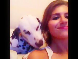 Woman warming up with her dog