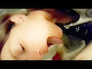 Young girl with an adorable face and a naughty dog